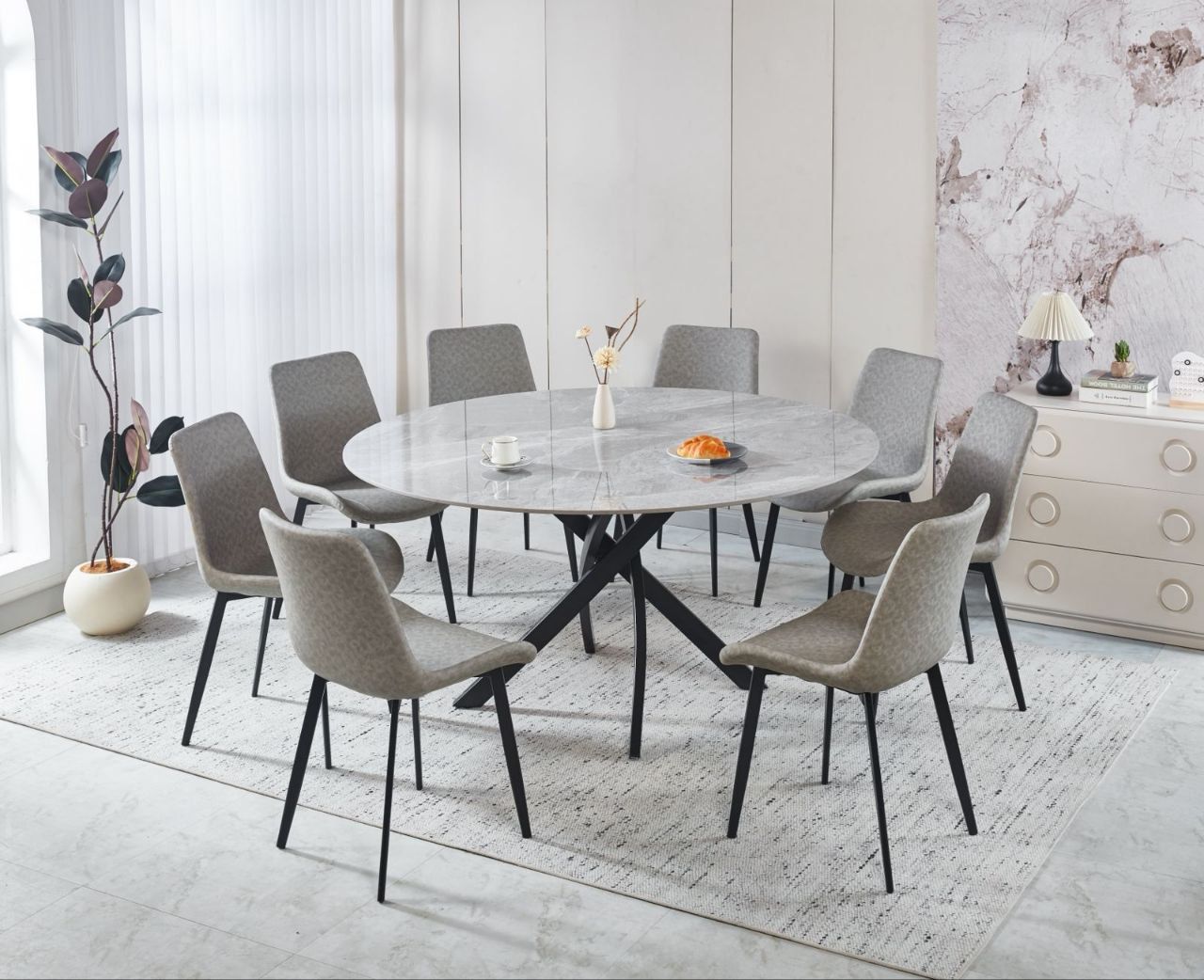 Round Ceramic Dining Table with Leather Chairs